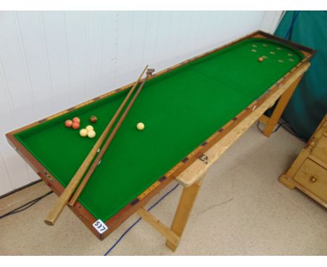 CONTINENTAL MAHOGANY CASED FOLDING BAGATELLE TABLE WITH IVORY BALLS 