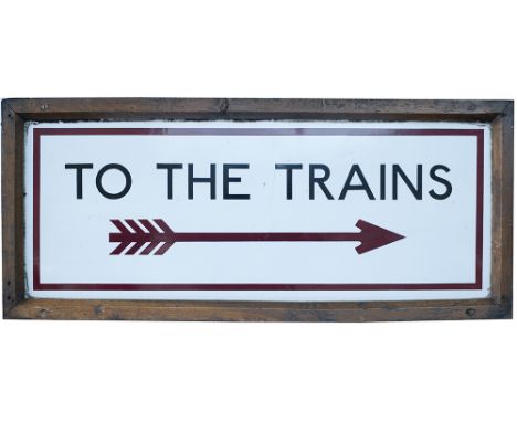 London Underground enamel sign in original Oak frame TO THE TRAINS, with Right pointing feathered arrow, in the classic Johns