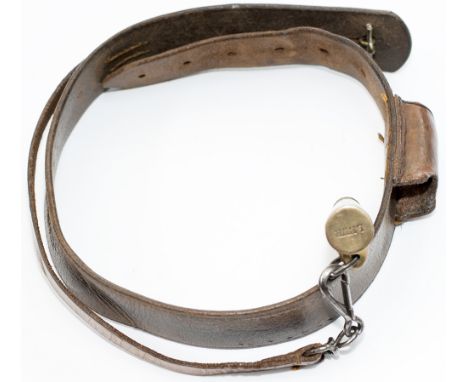 LNWR Policeman’s whistle on a leather bandolier type strap with integral whistle pocket. Brass whistle clearly stamped LNWR i