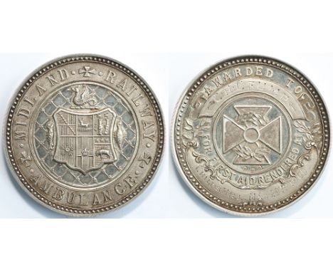 Midland Railway large silver medal; one side MIDLAND RAILWAY AMBULANCE with CoA, the other AWARDED TO C.R. CRUMP FOR FIRST AI