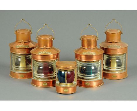 Two pairs of copper yacht lamps, and another smaller similar lamp.  Tallest 20 cm. 