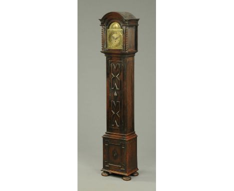 An oak cased grandmother clock, with three train spring-driven movement.  Height 167 cm.  CONDITION REPORT: The clock  has a 