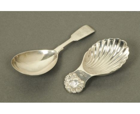 Two silver caddy spoons, one shell shaped, Birmingham mark modern, the other London 1850. 