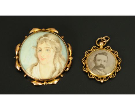 A portrait miniature pin brooch, with pendant.  Largest diameter 46 mm. 
