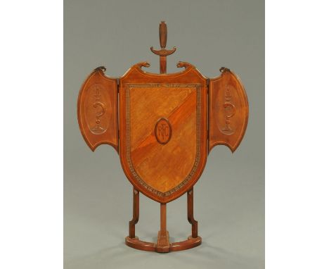 A Royal Flying Corps 1914-1918 folding fire screen, oak and mahogany and with original instruction plan.  Height 40 cm, width