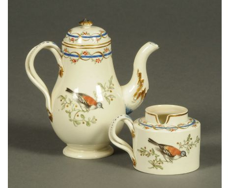 A 19th century Leeds Ware miniature coffee pot, decorated with a bird, and a similar sugar basin.  Tallest 14 cm.  CONDITION 