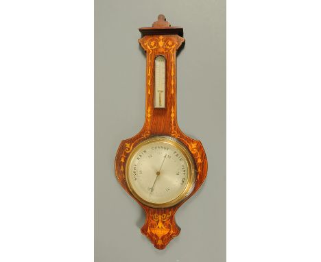 An Edwardian inlaid mahogany aneroid barometer.