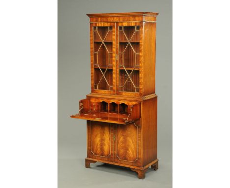 A mahogany reproduction George III style secretaire bookcase, with moulded cornice, pair of glazed doors, secretaire drawer a