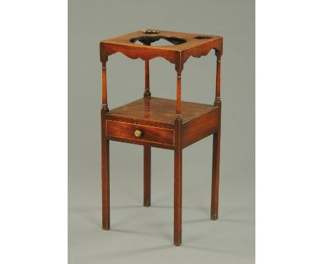 A Georgian mahogany square washstand, fitted for a basin. with single drawer and raised on legs of square section.  Width 37 