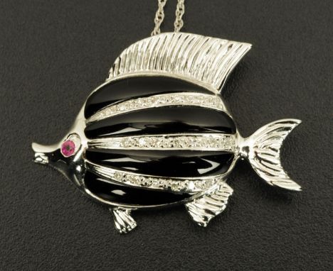 An 18 ct gold fish pendant, with chain, stamped "18 k" and "750".  Length 40 mm. 