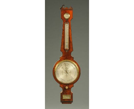 A large early 19th century mahogany and ebony strung barometer, by Johnson of Harrow.  Height 113 cm. 