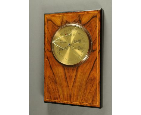 An inlaid walnut aneroid barometer, with brass dial bearing plaque "Acme Barometers No. 116".  49 cm x 32 cm.