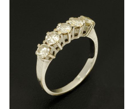 An 18 ct gold five stone diamond ring, +/- 1 carat in total, size K.