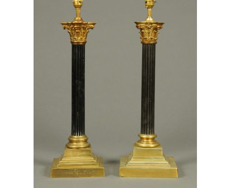 A pair of Victorian Corinthian column oil lamp bases, converted to electricity.  Height excluding light fitting 48 cm.  CONDI