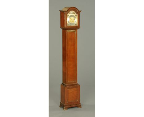 A walnut grandmother clock, with three-train movement by Elliott, the face marked "Boodle & Dunthorne, Chester".  Height 151 