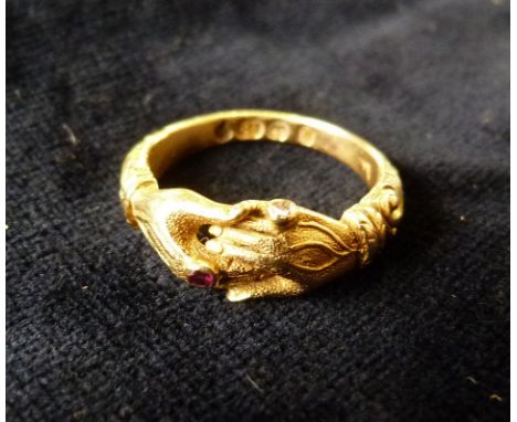 A William IV 18ct. Gold Ring in the form of two hands each wearing a ring, one ruby and one diamond, 4.5 gms