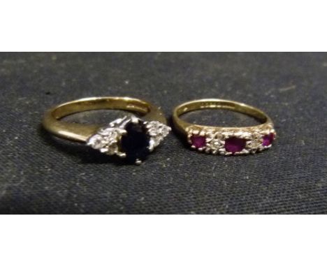 A 9ct. Gold Dress Ring, set rubies and diamonds together with another similar 9ct. gold dress ring