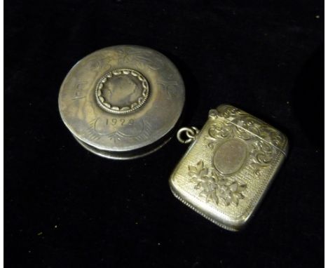 A Birmingham Silver Vesta Case with engraved decoration together with a cylindrical silver compact