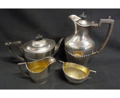 A Victorian Silver Three Piece Tea Service of Half Lobed Form, comprising teapot, cream jug and sugar bowl, London 1895, toge