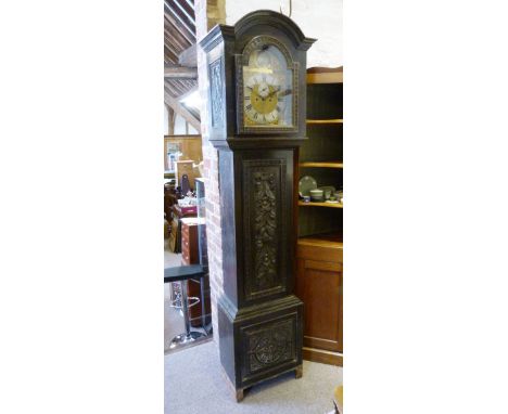 A 19th Century Carved Oak Longcase Clock, the brass dial with corner spandrels and Roman numerals with subsidiary seconds dia