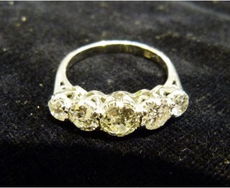 An 18ct. White Gold Five Stone Diamond Ring, set with five graduated stones within a pierced setting, approximately 1.80 ct.