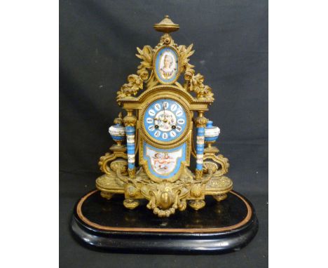 A 19th Century French Gilt Metal and Porcelain Mounted Mantle Clock, the painted dial with Roman numerals and two train movem