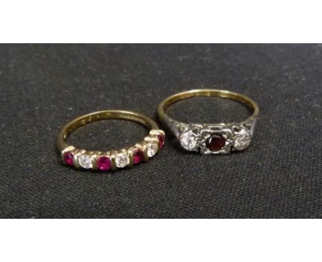 A 9ct. Gold Ruby and Diamond Band Ring, set with four rubies and three diamonds, together with an 18ct. gold garnett and diam