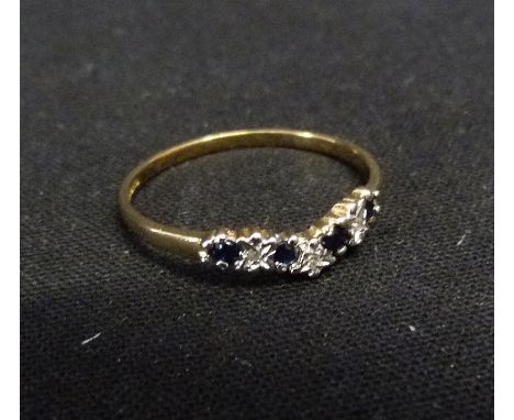 A 9ct Gold Sapphire and Diamond Wishbone Ring, set with four sapphires and three diamonds