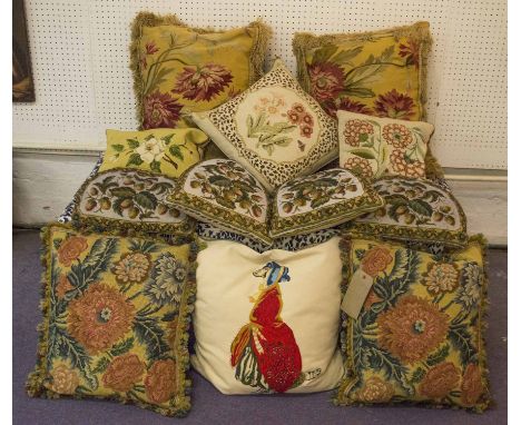CUSHIONS, four floor tapestry, four floral bead work, three embroidered floral and one depicting a wolf. (12)