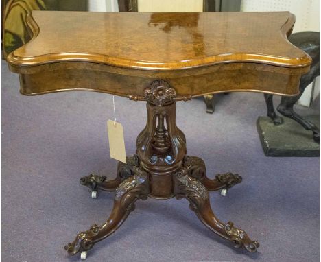 CARD TABLE, Victorian burr walnut, serpentine baize lined foldover carved column and quadrapartite support, 75cm H x 91cm x 4