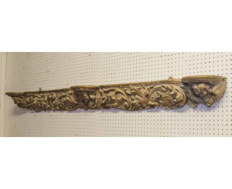 CARVED SHELF, giltwood with mask and foliate decoration, 13cm H x 154cm x 16cm.
