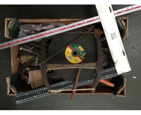 A quantity of vintage tools including Stanley knives, wooden mallets, a bow saw and a brass and iron plumb line