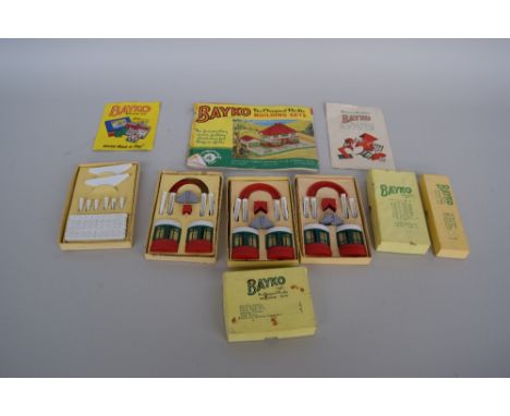 A Bayko building set number 4 with original booklets and plans plus additional accessories