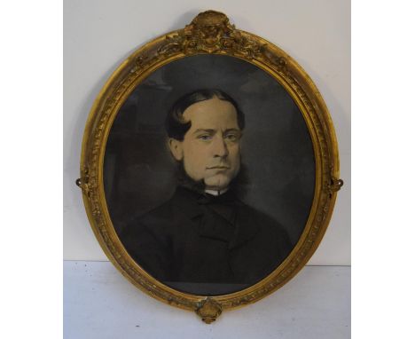 A 19th century portrait of a gentleman, charcoal and pastel on paper, in gilt oval frame, laid on board, label on reverse rea