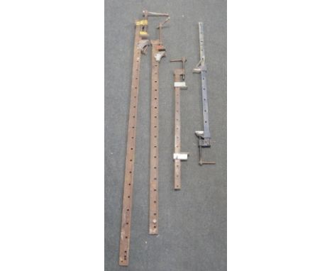 Four sash clamps of various sizes