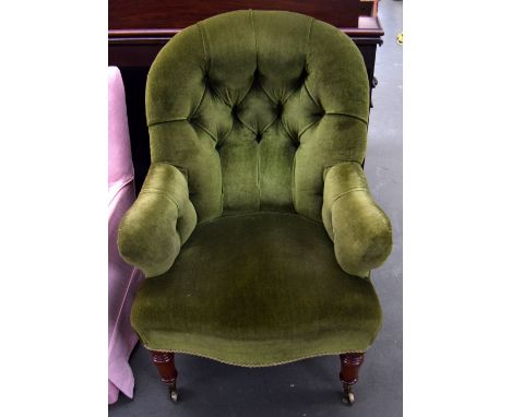 A green button back salon chair 90cmH