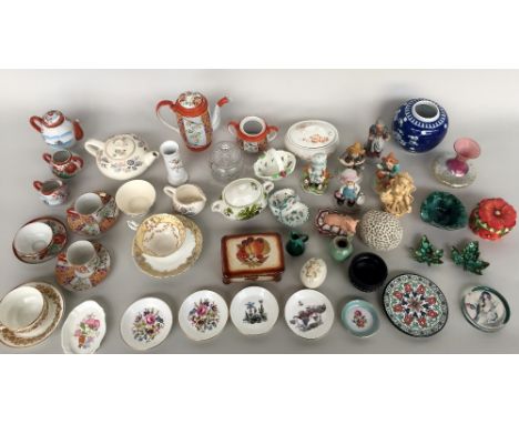 A mixed lot including a blue and white Chinese ginger jar 11.5cmH, three tea pots with sugar bowl and milk jug, a butter dish