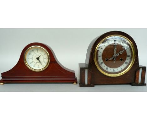 An Enfield mantlepiece carriage clock in a wooden setting together with a Westminster chime carriage clock