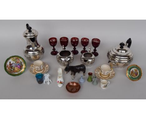 A mixed lot including a teapot, sugar bowl, two espresso cups with saucers, three red glasses, a ceramic figure of a donkey a