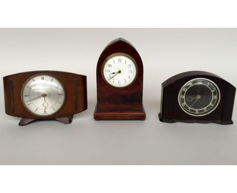 A Metamec 8 day mantel clock, silver dial, wooden case with brass decoration on each side of the dial, 23cmW and a narrow con