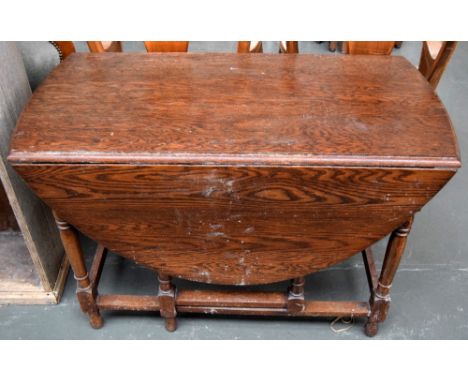 An oak gate-leg table 102cmW x 72cmH