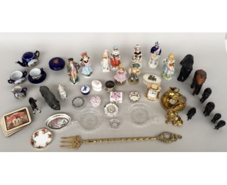 A mixed lot to include twelve ceramic figurines, trinket boxes, a four pieces small tea set cobalt blue heighten in gilt, sev