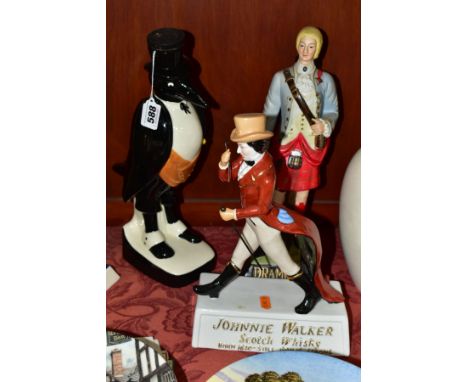 THREE ADVERTISING FIGURES, comprising a Royal Doulton 'Old Crow' decanter, height 33cm (empty), a Johnnie Walker Scotch Whisk