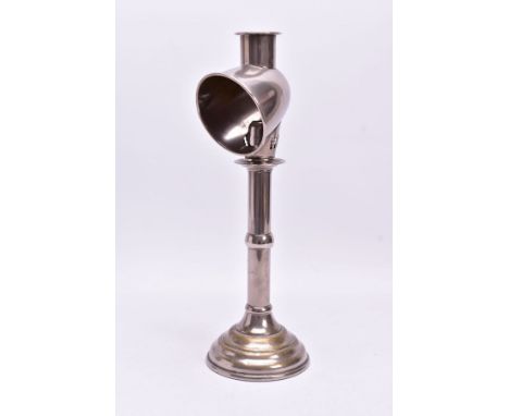AN EARLY 20TH CENTURY PLATE ON BRASS STUDENTS LAMP, removable reflector hood, soldered repair below sconce, stepped circular 