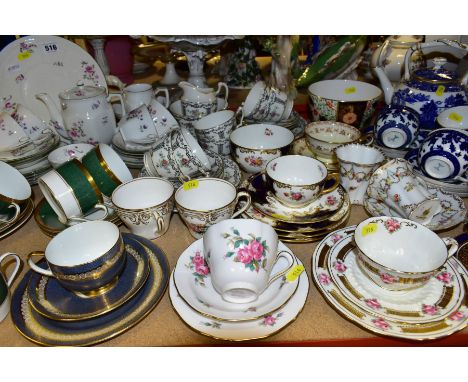 A COLLECTION OF CERAMIC TEAWARES to include six Coalport cups and saucers with green and gold bands, a part set of Foley comp