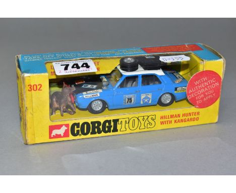 A BOXED CORGI TOYS HILLMAN HUNTER RALLY CAR, No 302, complete  with  Kangaroo figure, decals have been applied, appears compl