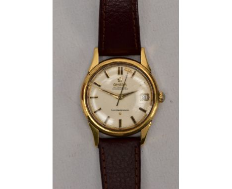 A GENTS 18CT GOLD OMEGA CONSTELLATION WRISTWATCH, automatic movement, round champagne dial signed 'Omega Automatic Chronomete
