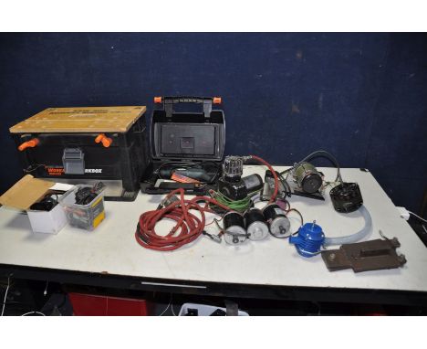 A TRAY CONTAINING A BESPOKE GRINDING WHEEL with motor, three 12v motors, a 240v motor, a 12v compressor/ tyre inflator, a Bla