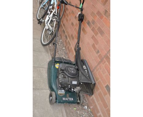A HAYTER HARRIER 41 PETROL LAWN MOWER with grass bag ( engine pulls freely but hasn't been started)