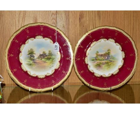 A PAIR OF ROYAL WORCESTER CABINET PLATES, pale yellow, claret and gilt ground border surrounding centre painted with titled t